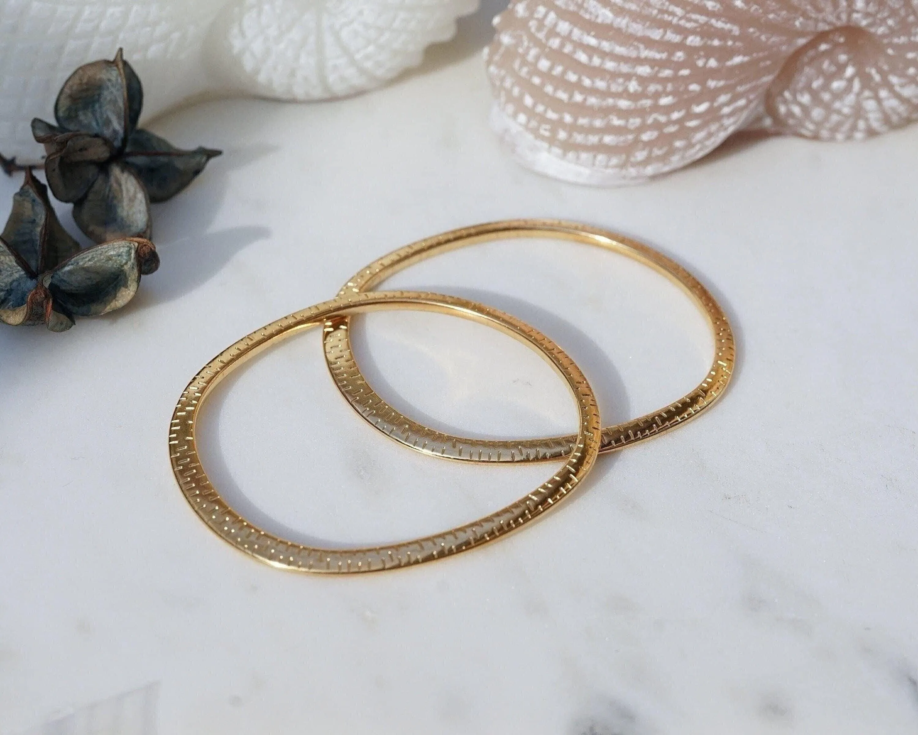 Gold Flat Oval Engraved Bangle