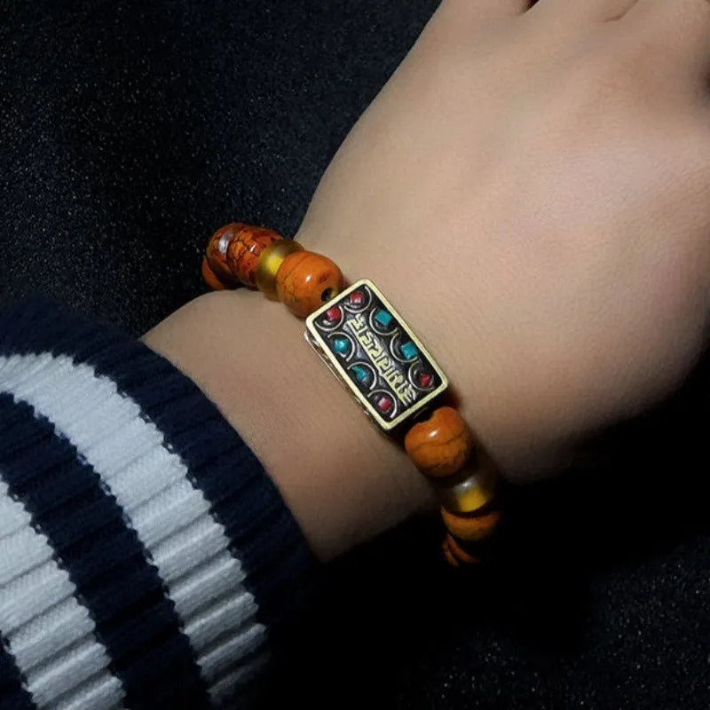 Handmade Yak Bone Bracelet with Bronze Mantra Charm