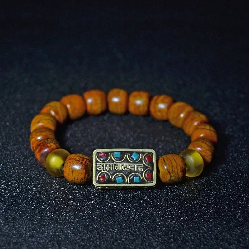 Handmade Yak Bone Bracelet with Bronze Mantra Charm