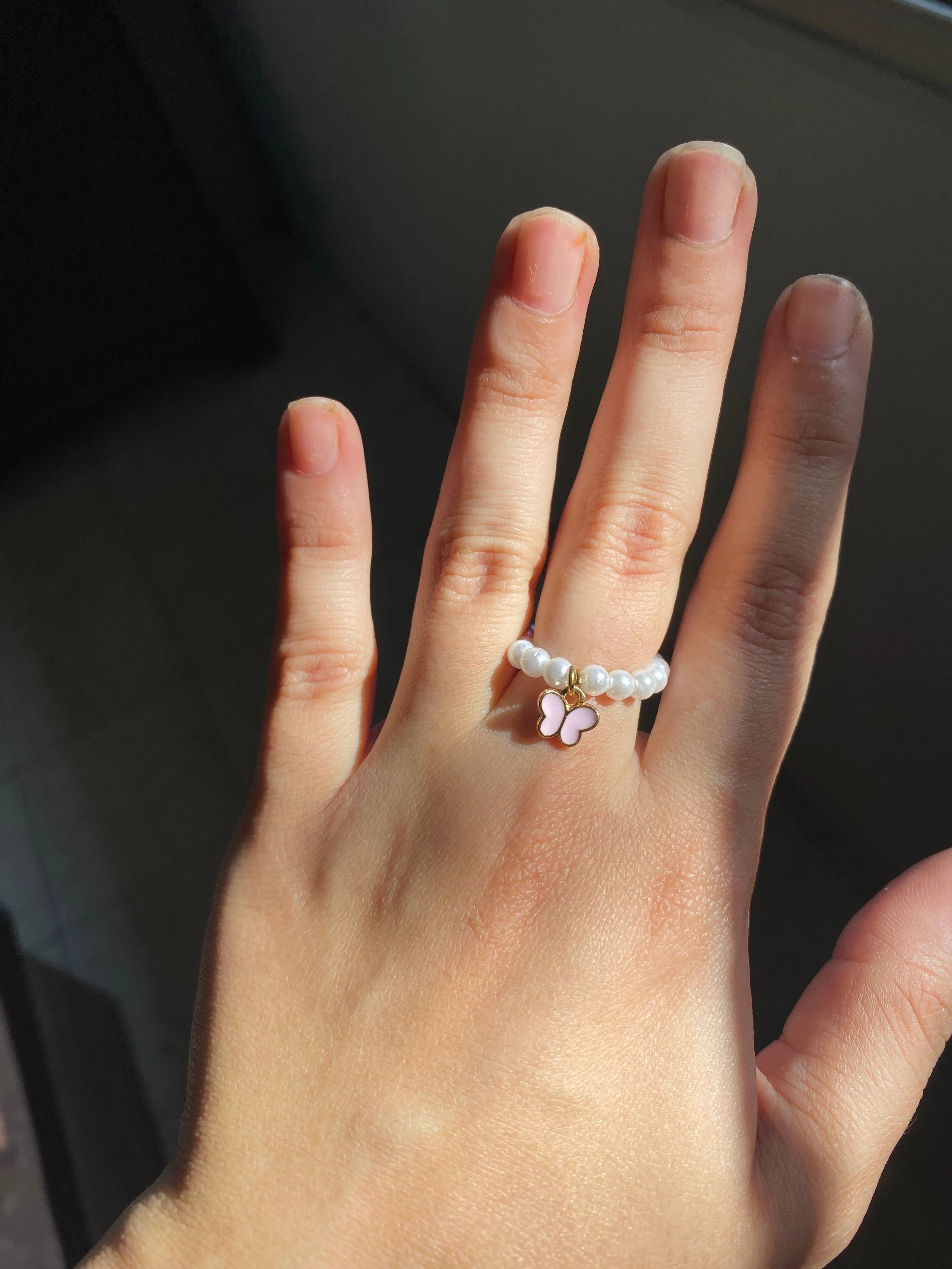 HANGING BUTTERFLY PEARL RING