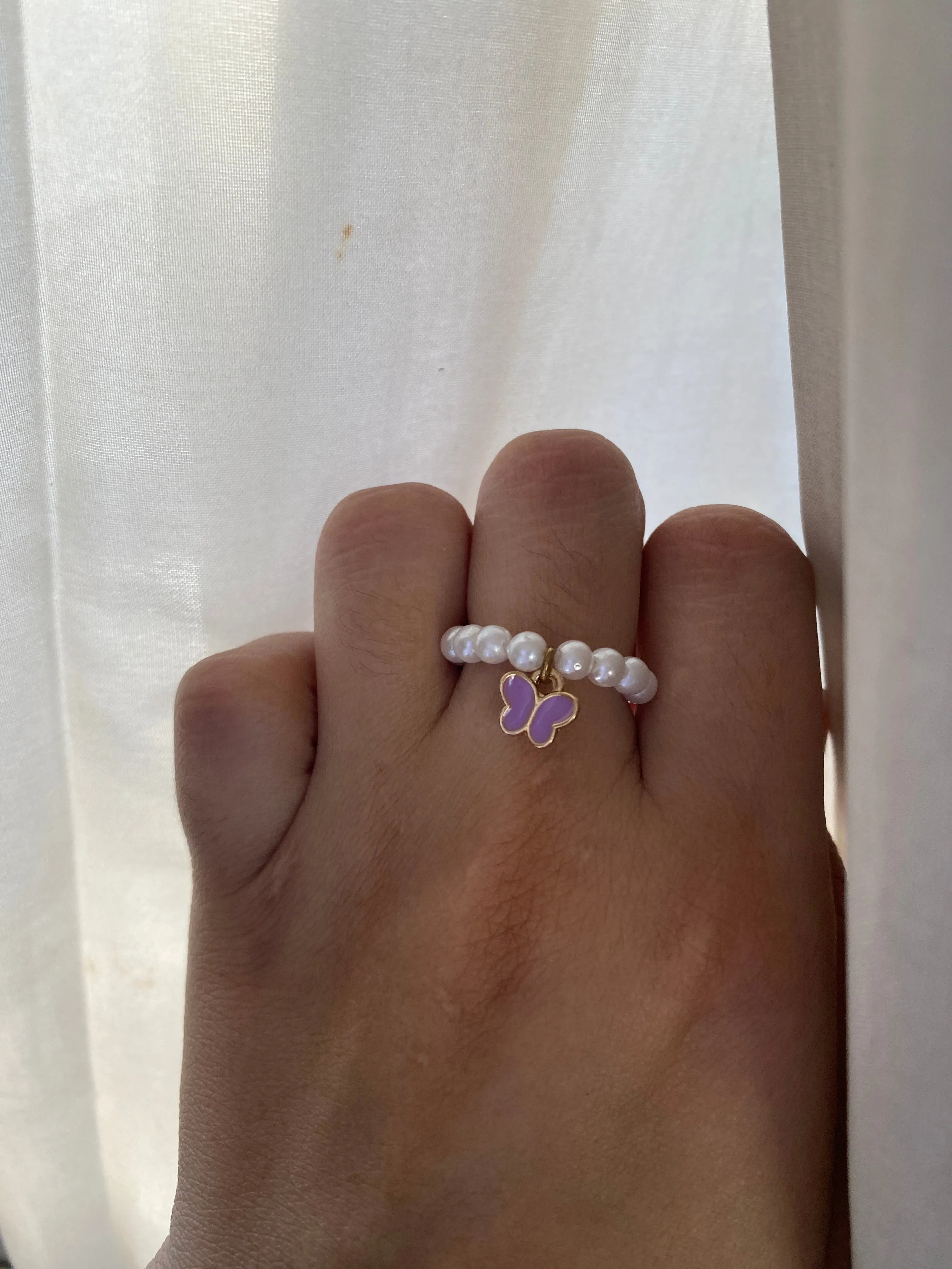 HANGING BUTTERFLY PEARL RING