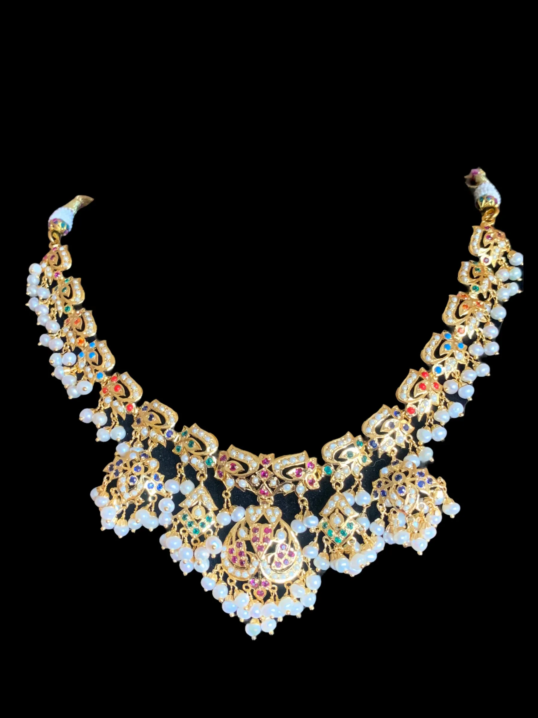 Navratan necklace  set with fresh water pearls in gold plated silver